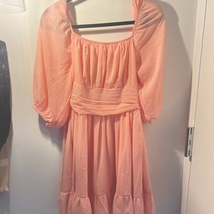 Babydoll balloon sleeve pink princess style mini dress with bow tie in the back